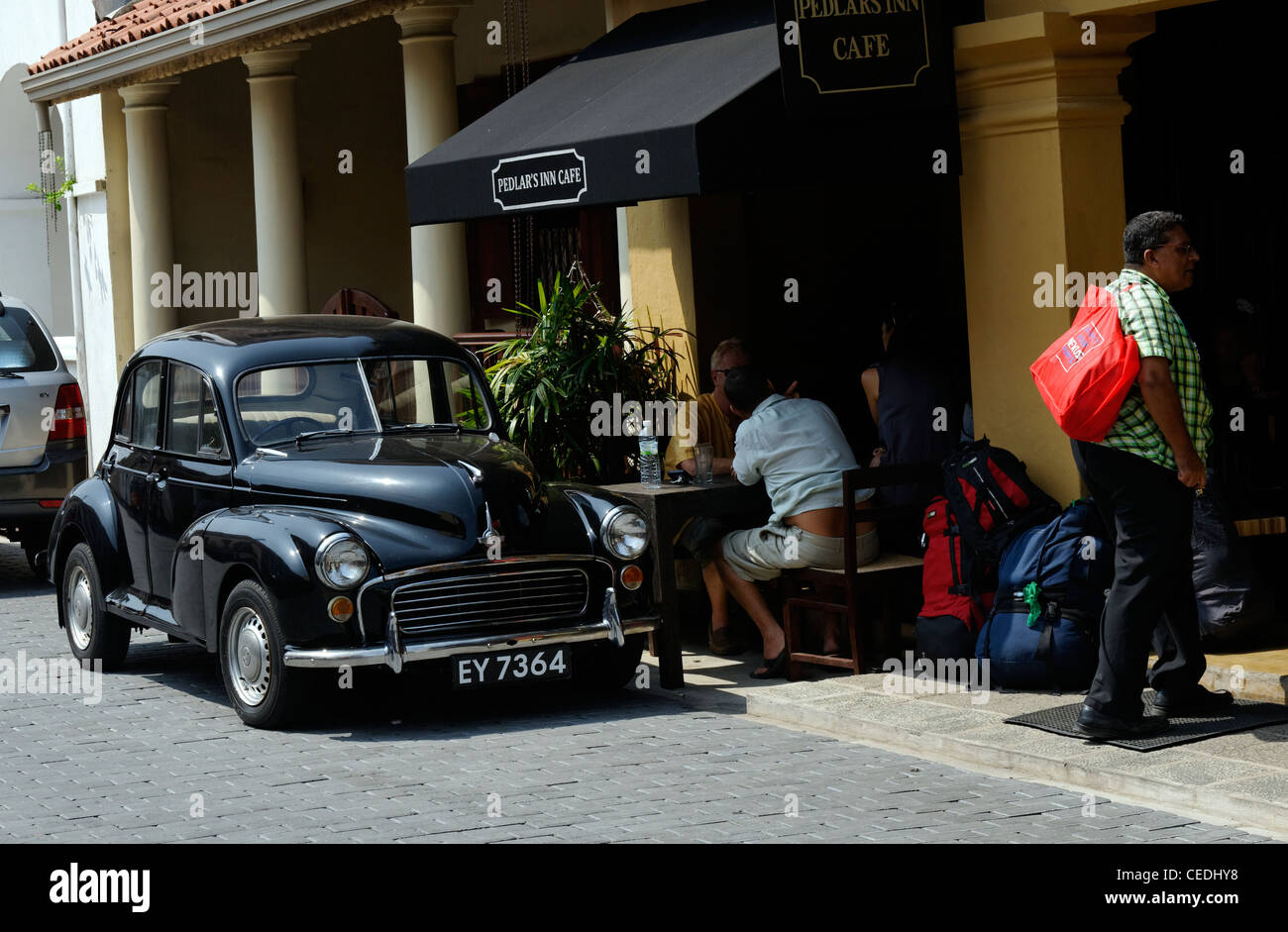 Morris Minor classic car parked outside a street café in Galle, Sri Lanka Stock Photo Alamy
