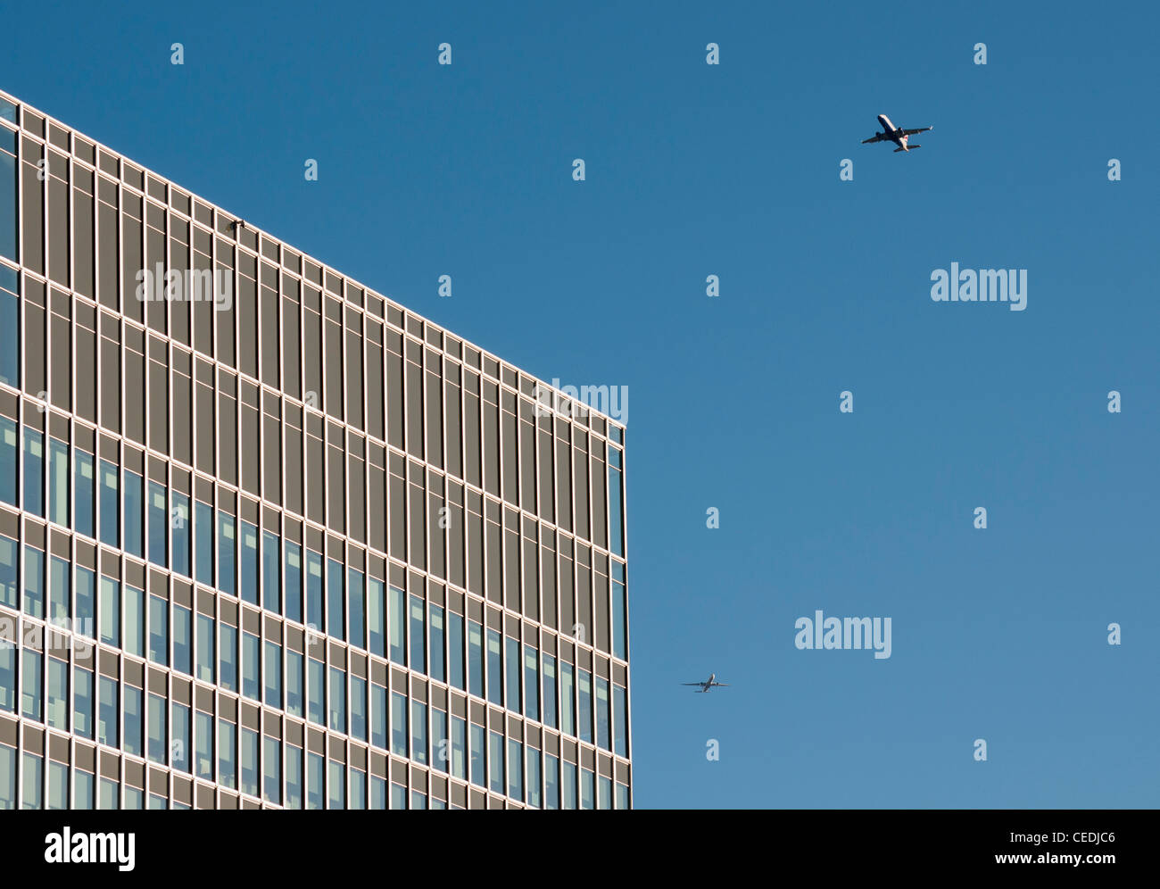 Two Jet Airliners and State Street Bank at 20 Churchill Place, Canary Wharf, Docklands, London, United Kingdom Stock Photo