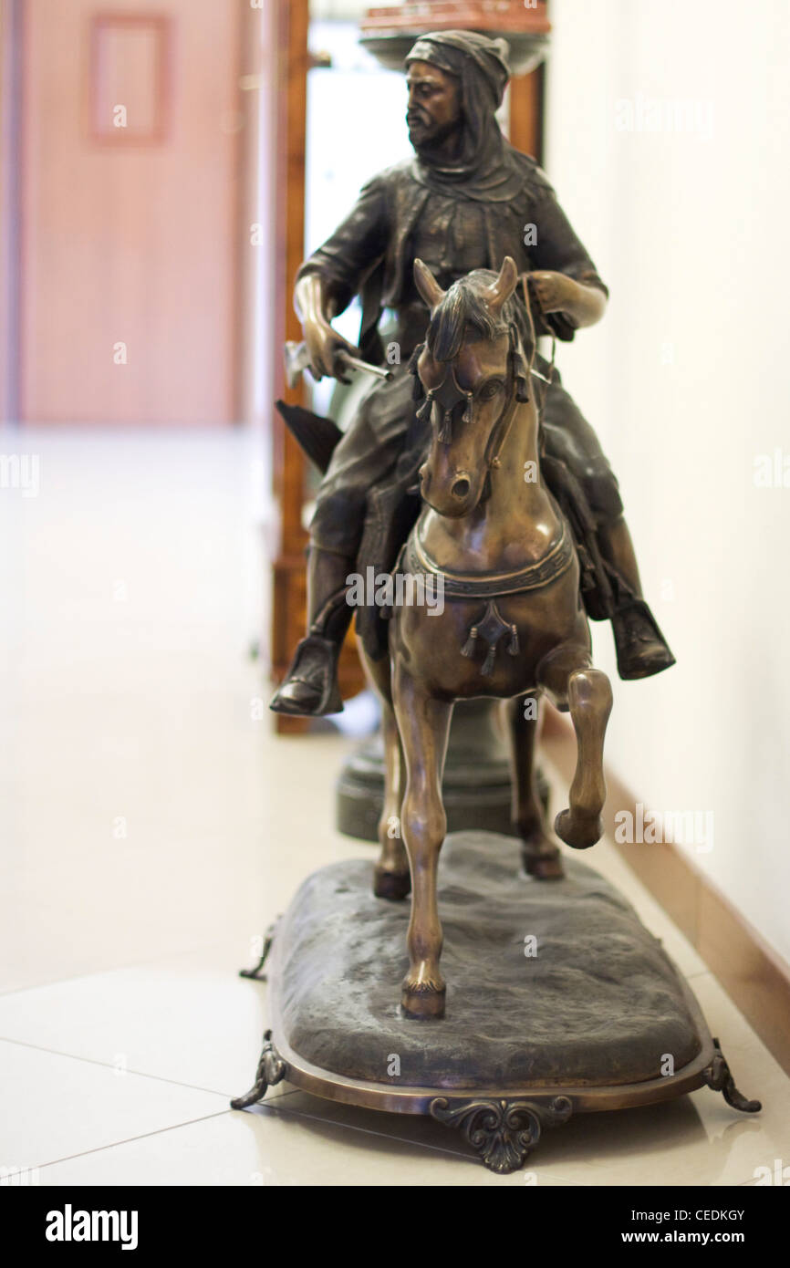 Bronze Statue of an Arabian knight on His Horse in a shop window in