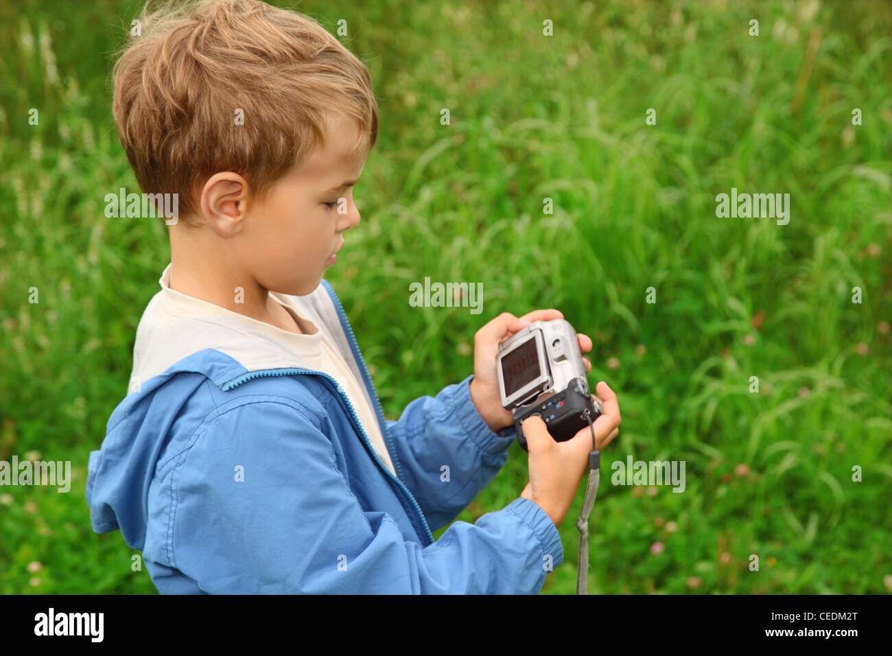 boy with photo camera outdoor Stock Photo