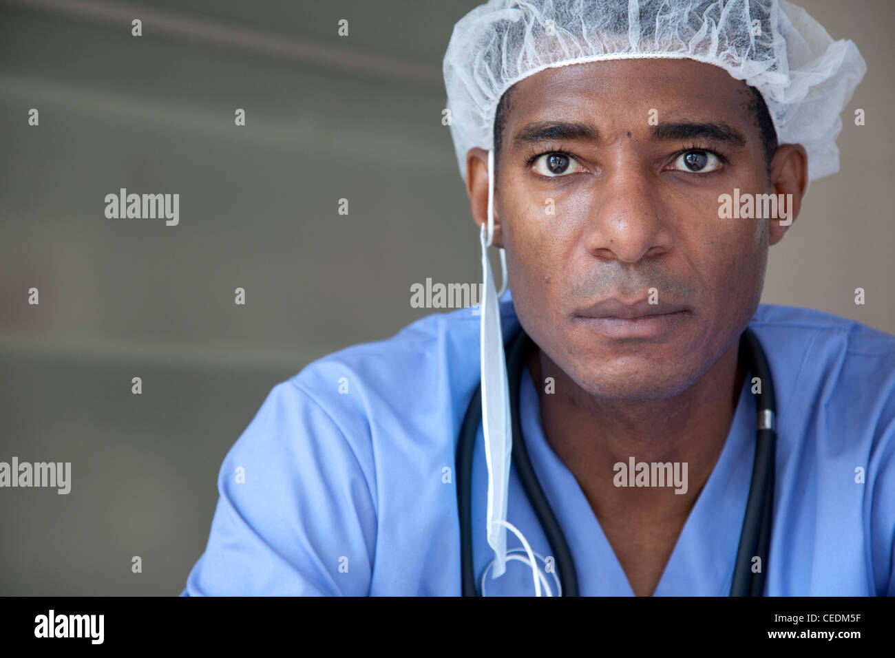 Black doctor in scrubs and surgical cap Stock Photo Alamy