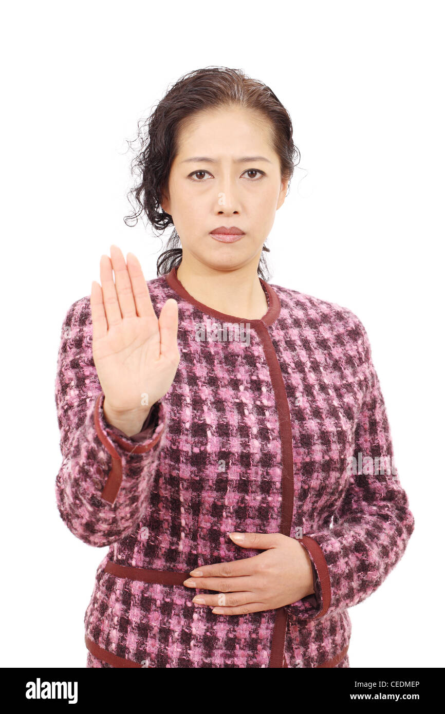 Asian businesswoman making stop sign Stock Photo