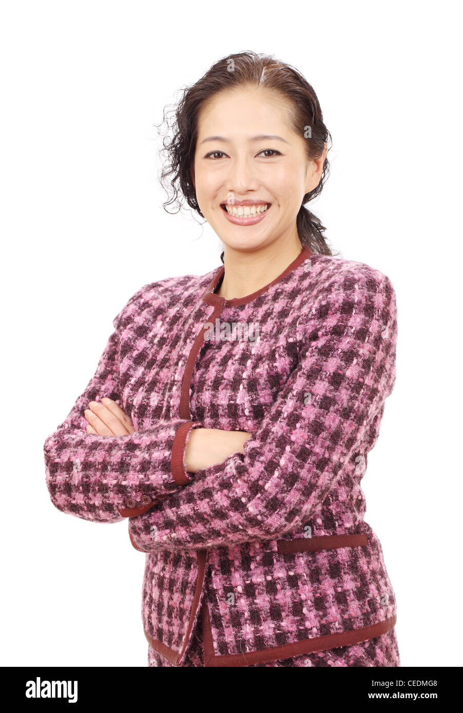 Smiling asian business woman with arms crossed Stock Photo - Alamy