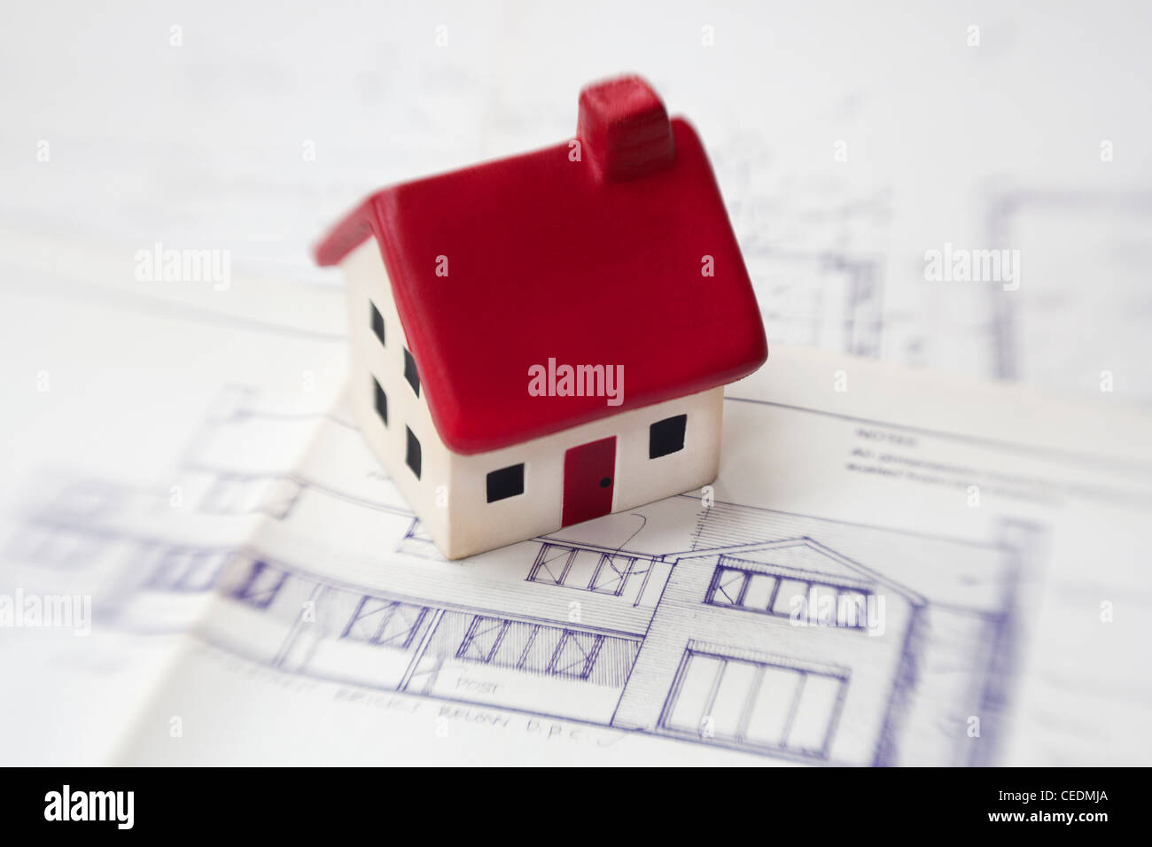 House with building plans Stock Photo