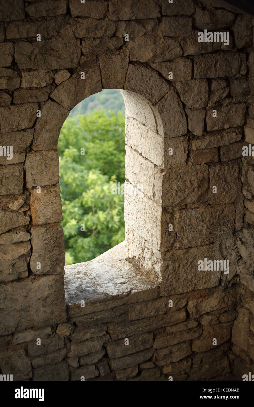 window in stone wall Stock Photo