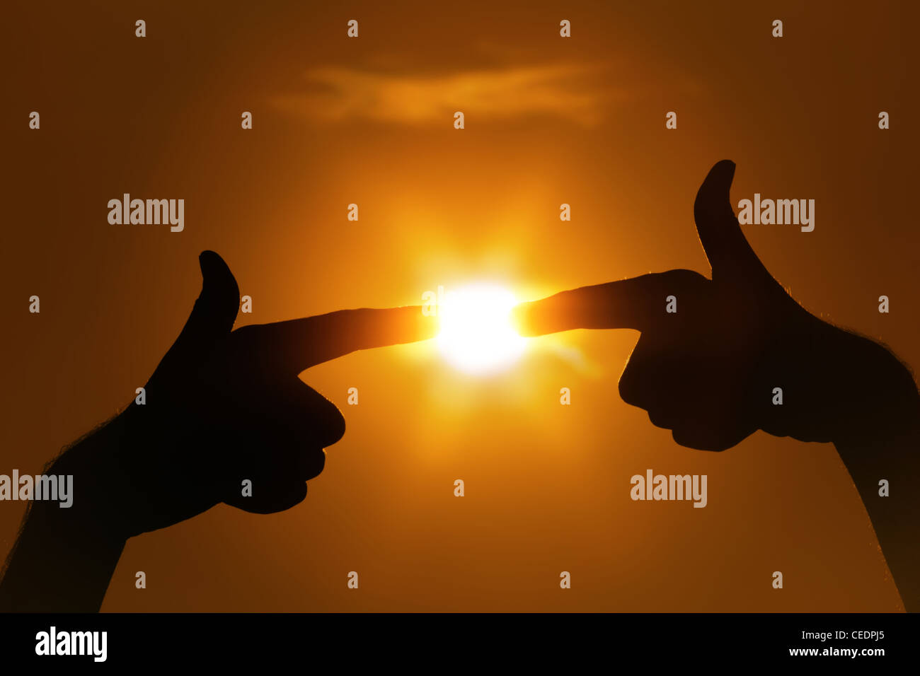 fingers pointing to sun gesture Stock Photo