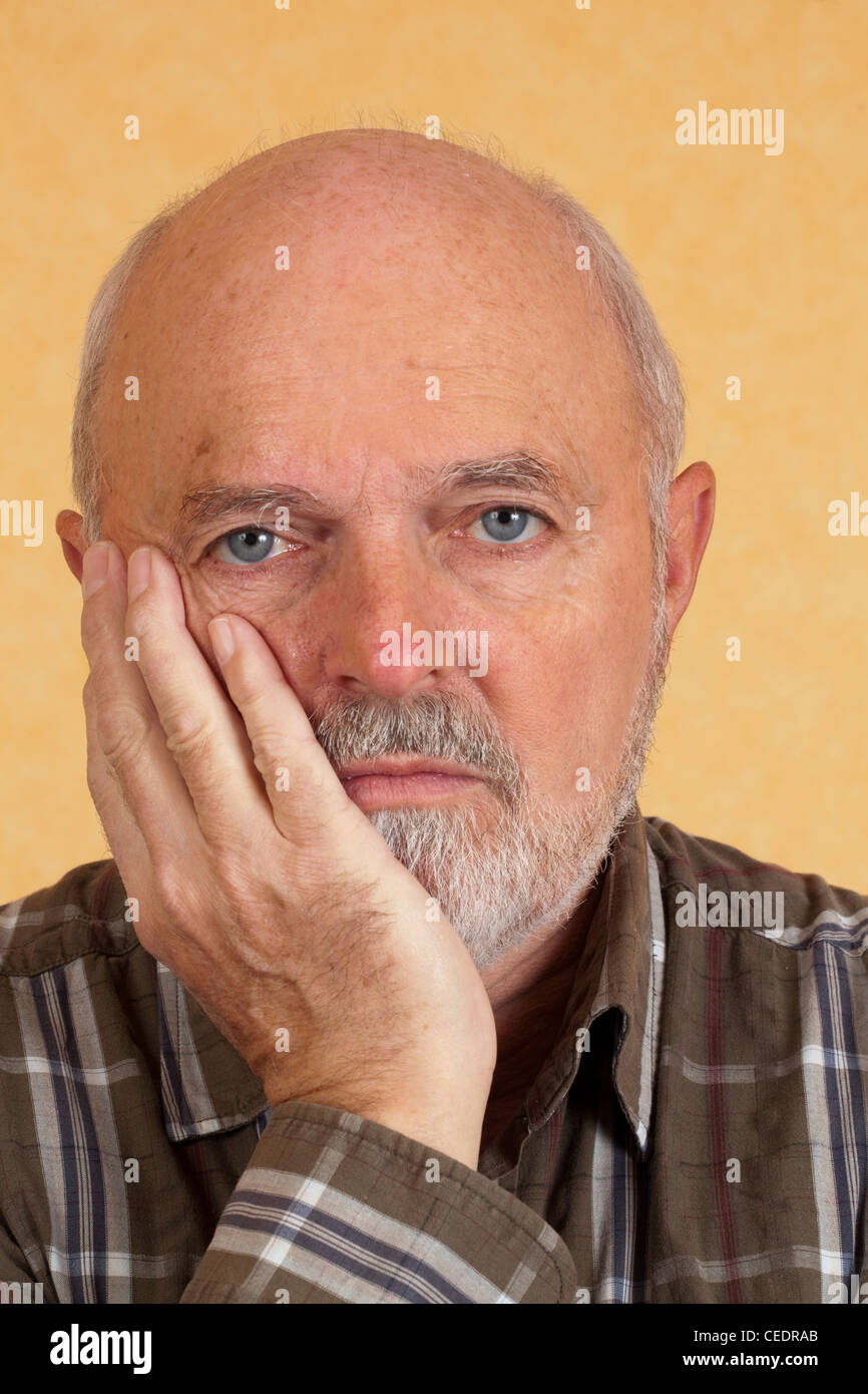 Depressive elderly man Stock Photo