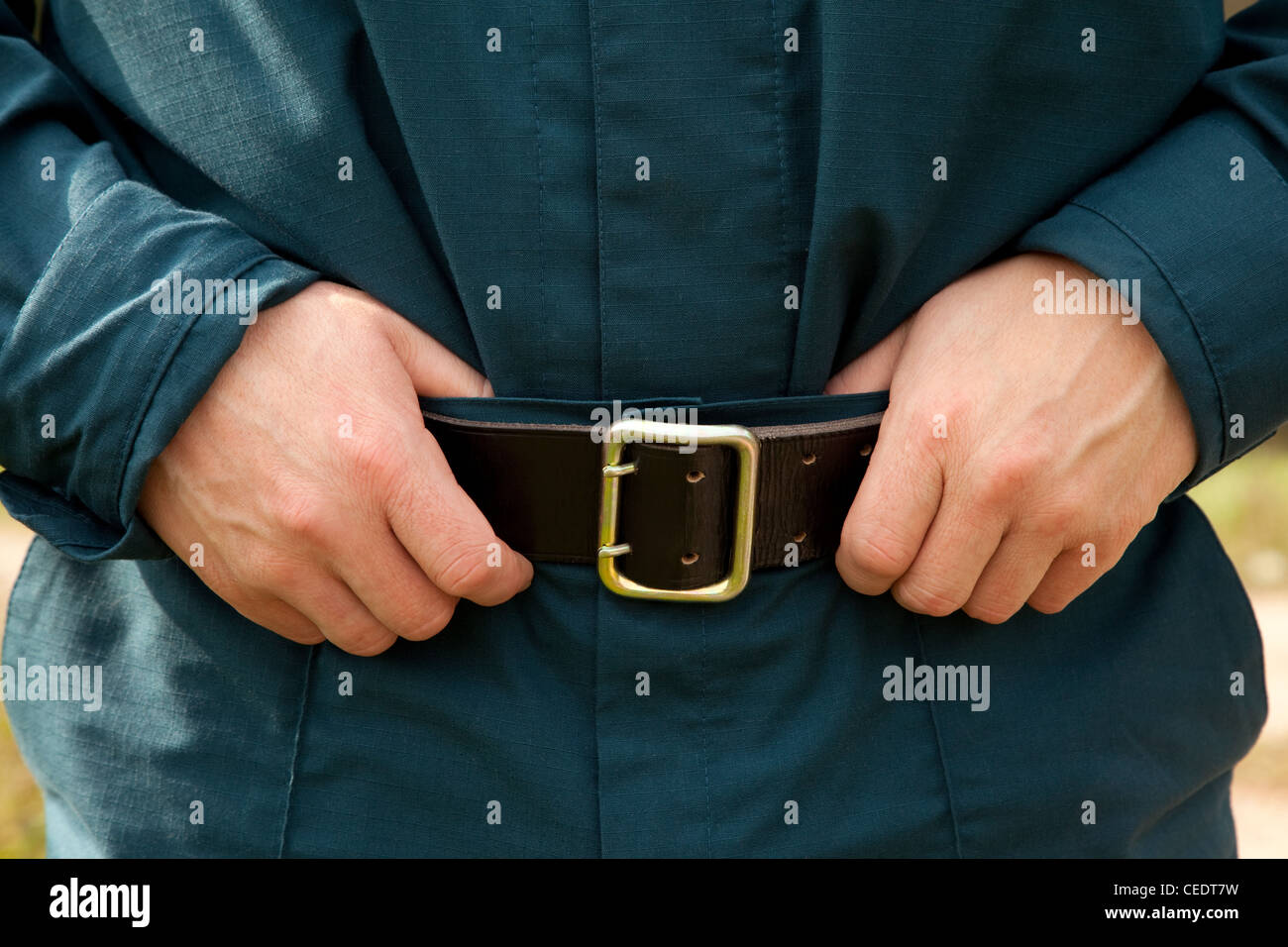 Hand on belt hi-res stock photography and images - Alamy
