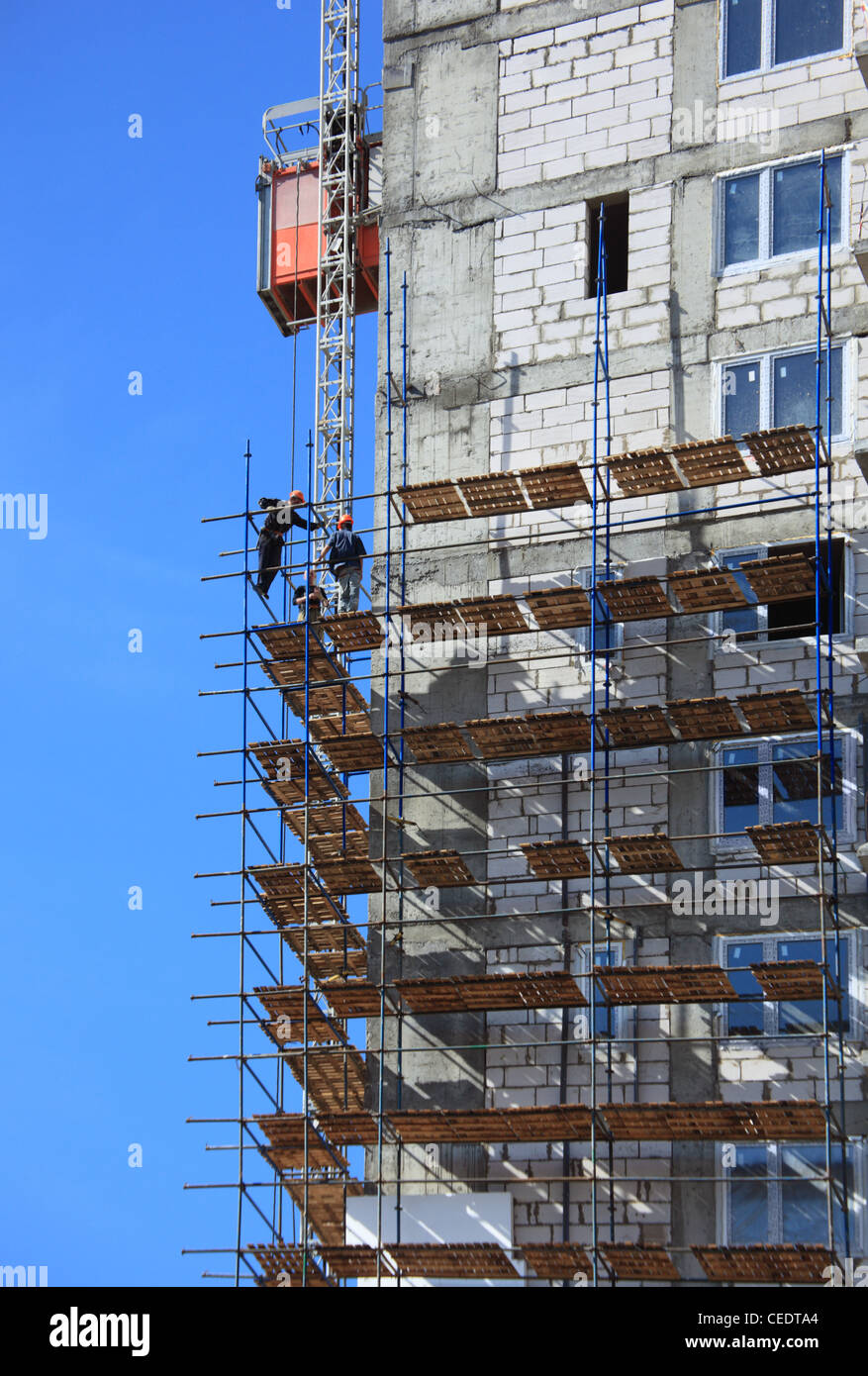 Building in scaffolds Stock Photo - Alamy