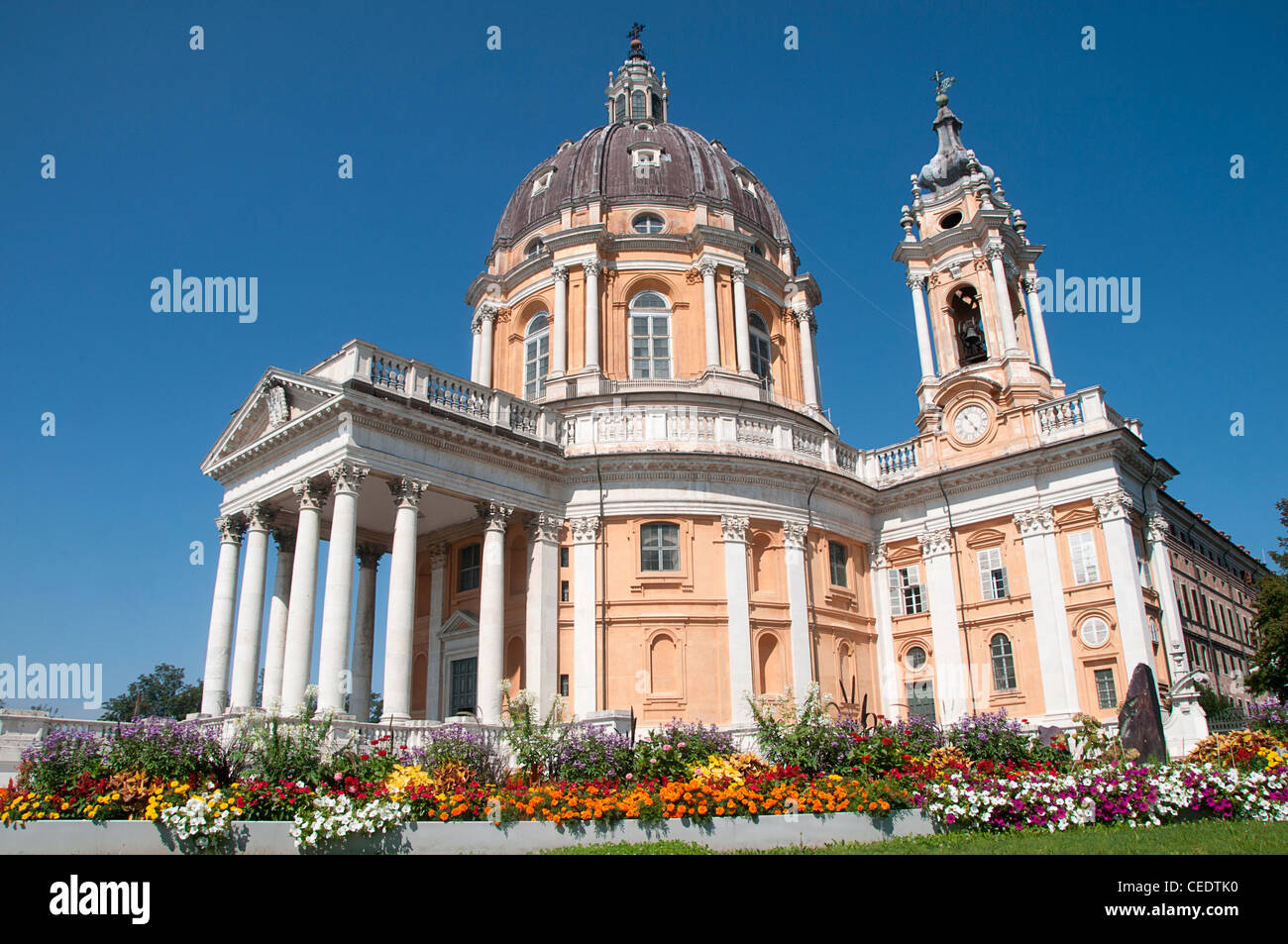 Italy, Piedmont, Turin, Basilica di Superga with flowering garden in foreground Stock Photo