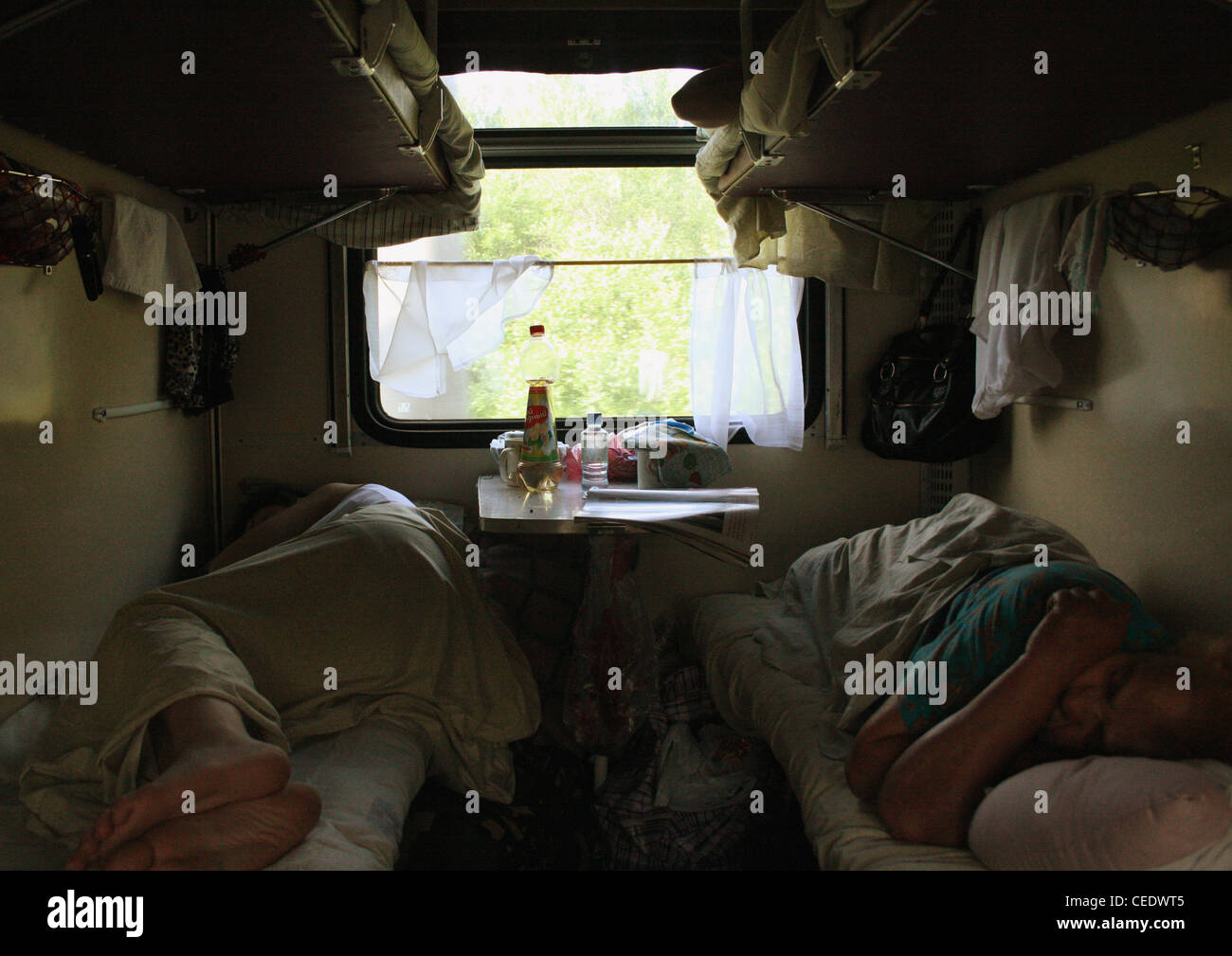 People sleeping on train hi-res stock photography and images - Alamy