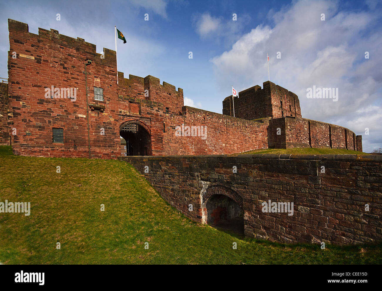 Carlisle Castle exterior from the front with the keep and bridge over the moat to the main entrance gate with portcullis Stock Photo