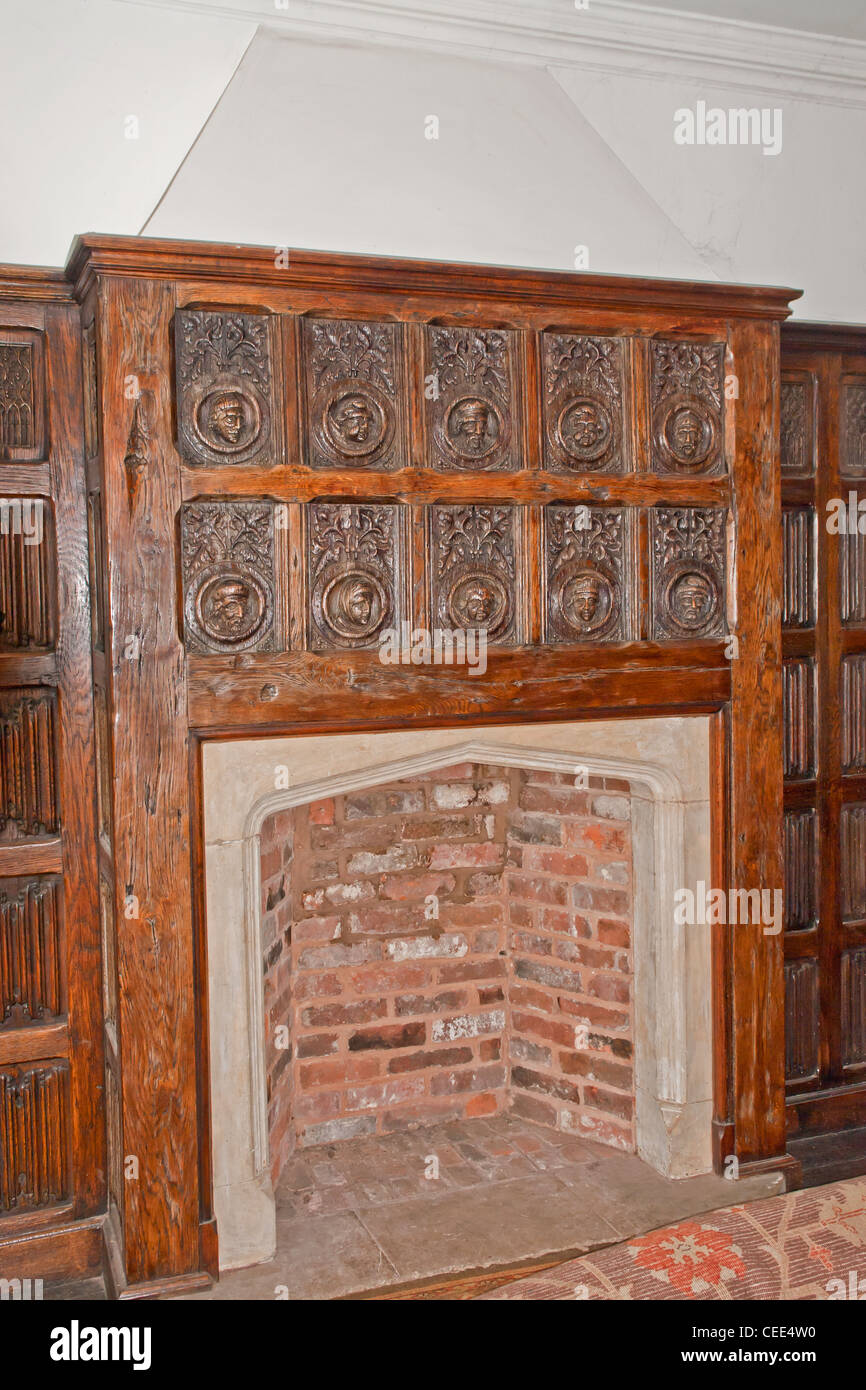 Fireplace in Castle Lodge, Ludlow, Shropshire. A medieval Tudor/Elizabethan building with a wealth of fine paneling. Stock Photo