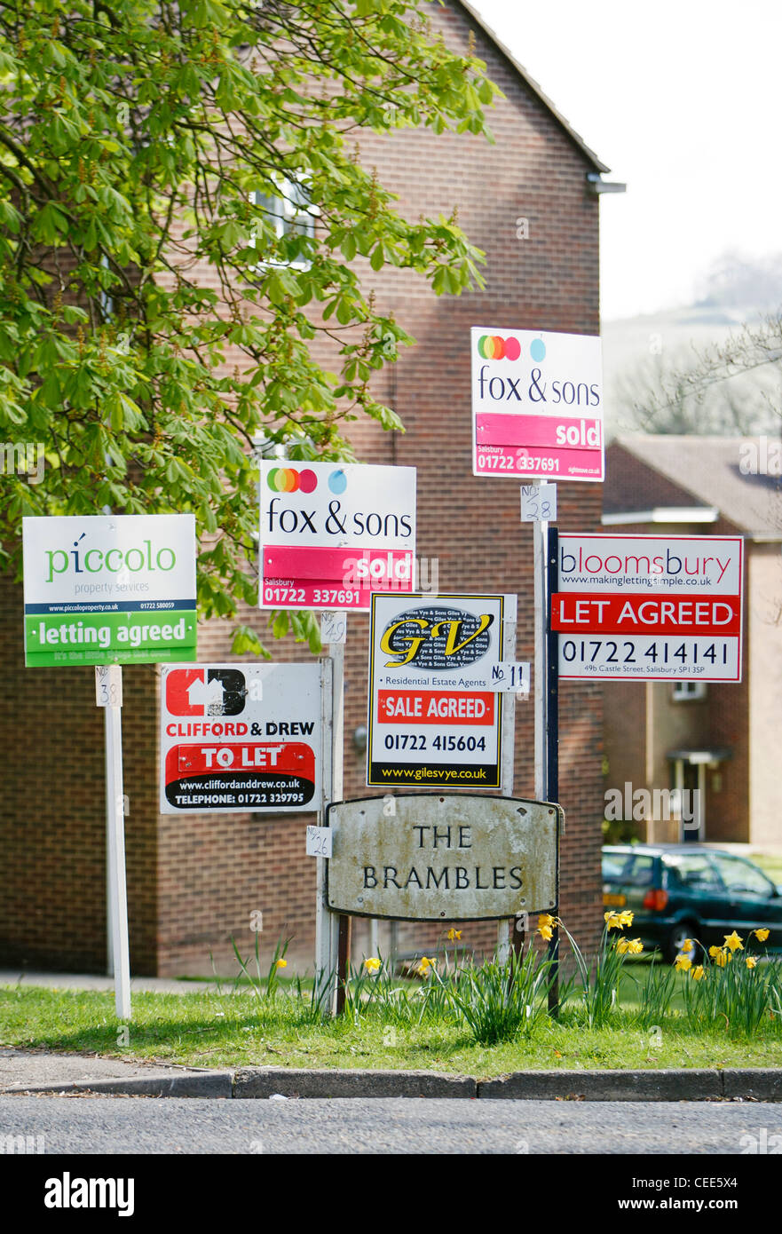 Estate agents boards Stock Photo Alamy
