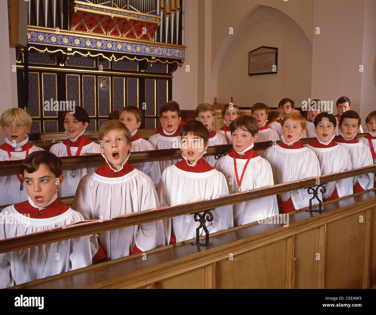 Boys school choir singing in chapel, Surrey, England, United Kingdom Stock Photo