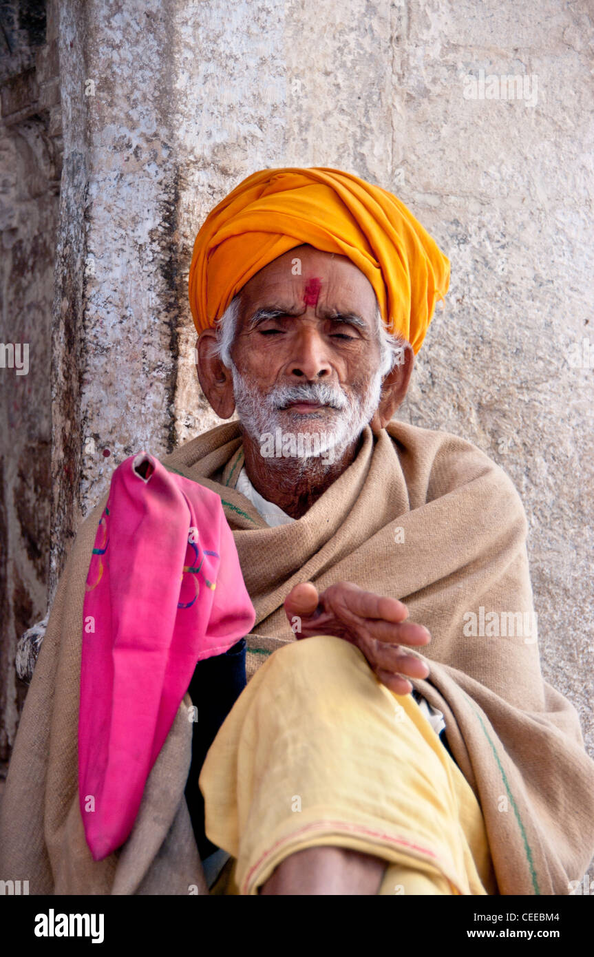 lost in prayer, an old man from India Stock Photo