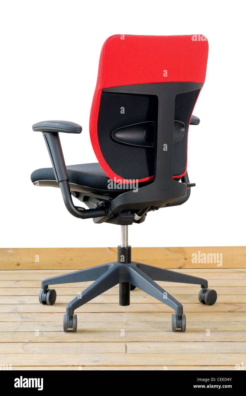 modern red office chair on wood floor over white background Stock Photo