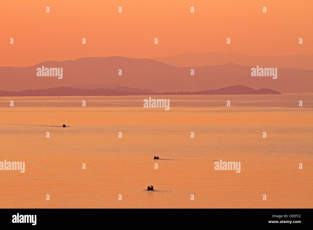 Boats at sunset,Armenistis beach,Sithonia,Halkidiki,Aegean sea Stock Photo