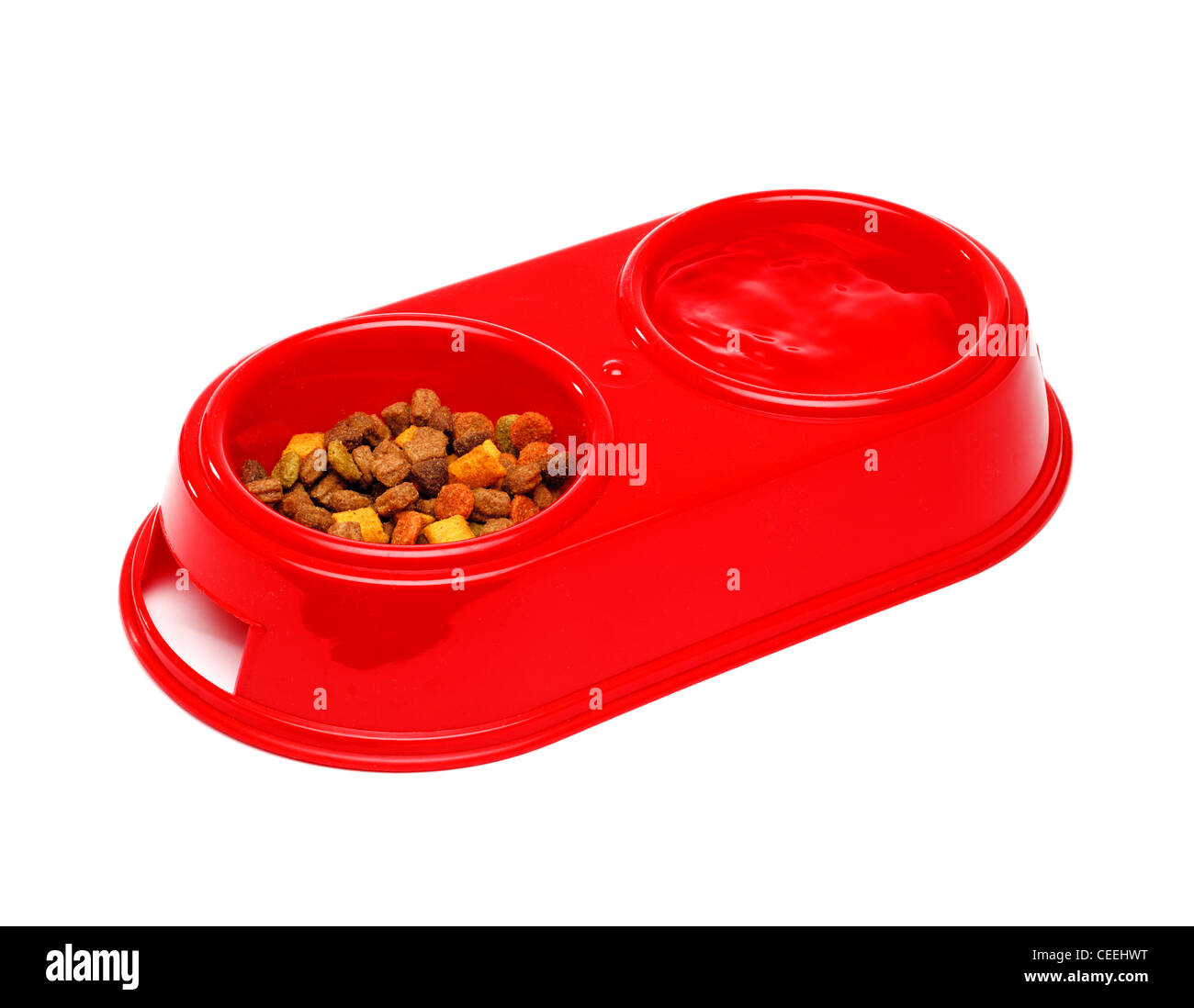 Cat bowls with dry food and water Stock Photo