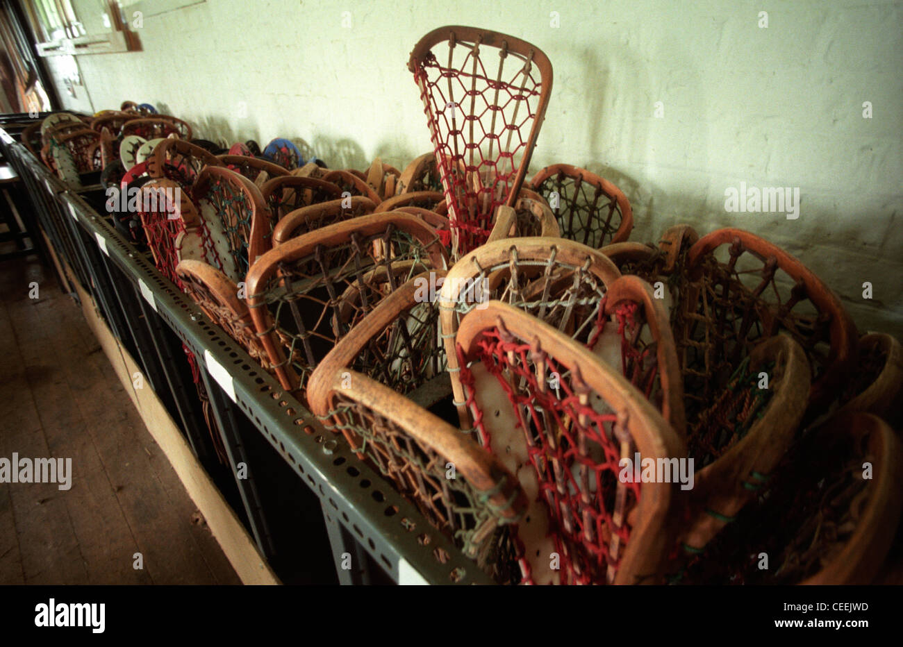 Lacrosse sticks in a rack in a sports pavilion at Roedean School for