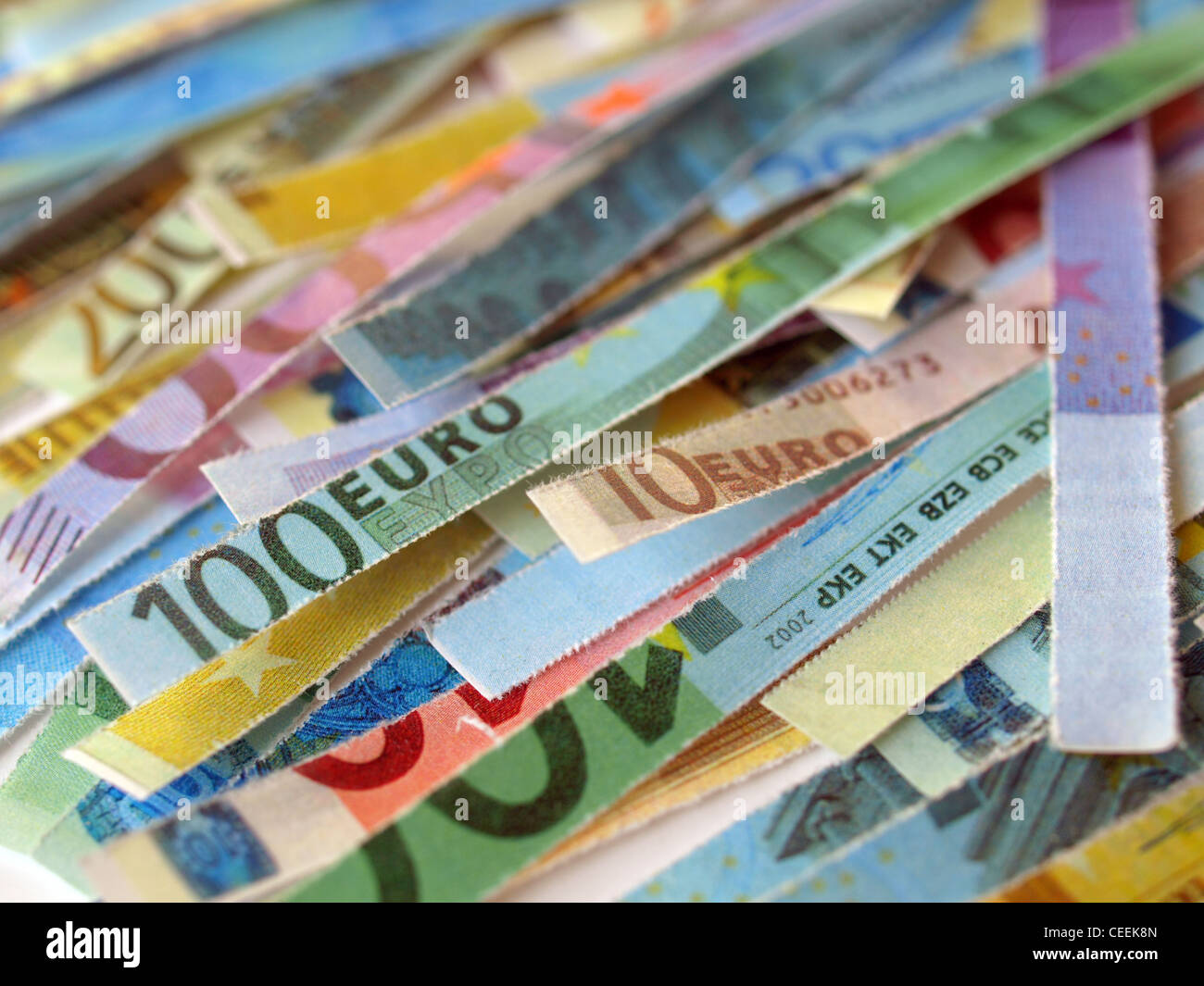 Money to burn - banknotes cut with a paper shredder Stock Photo