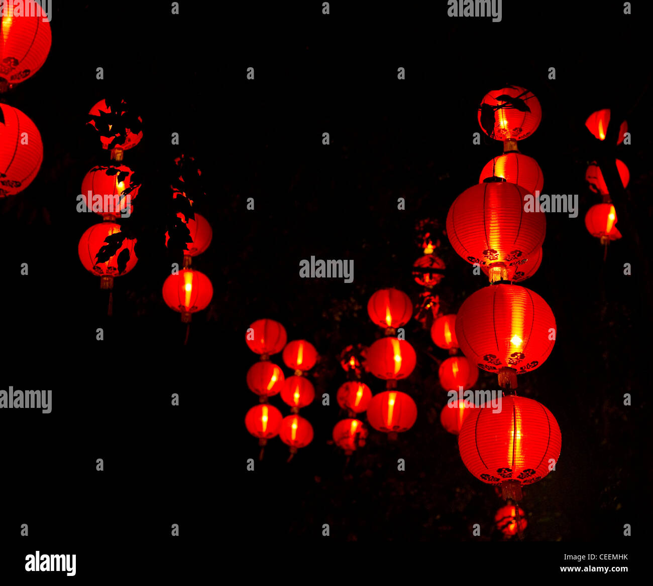 silk lanterns lighting up the night sky of singapore during the mid