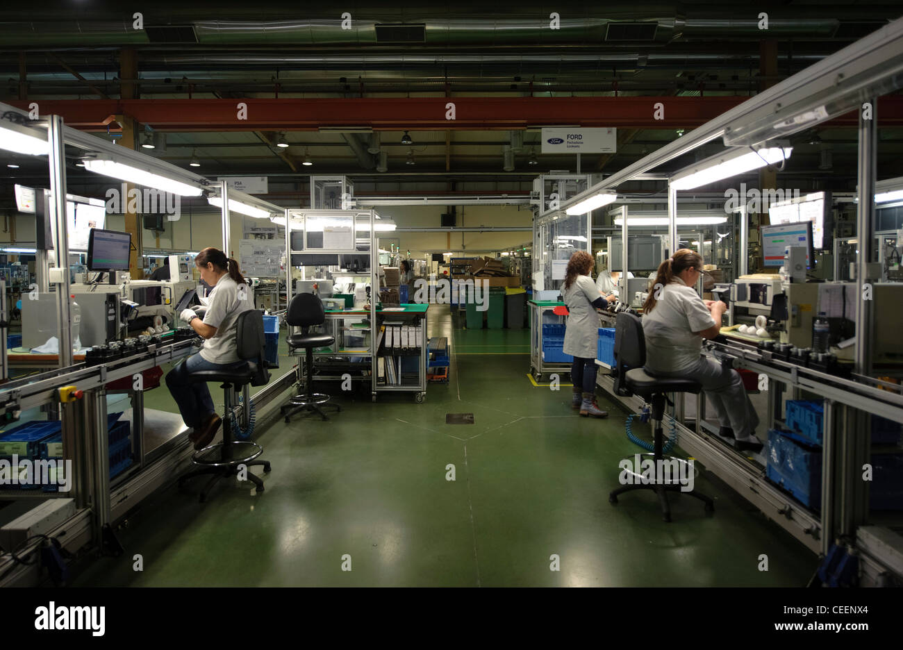Factory workers at the assembly line Stock Photo - Alamy