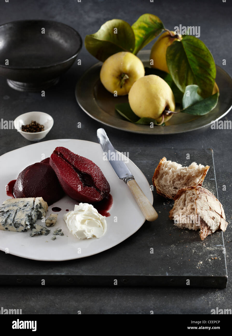 Poached quince in red wine spiced chilli hot Stock Photo