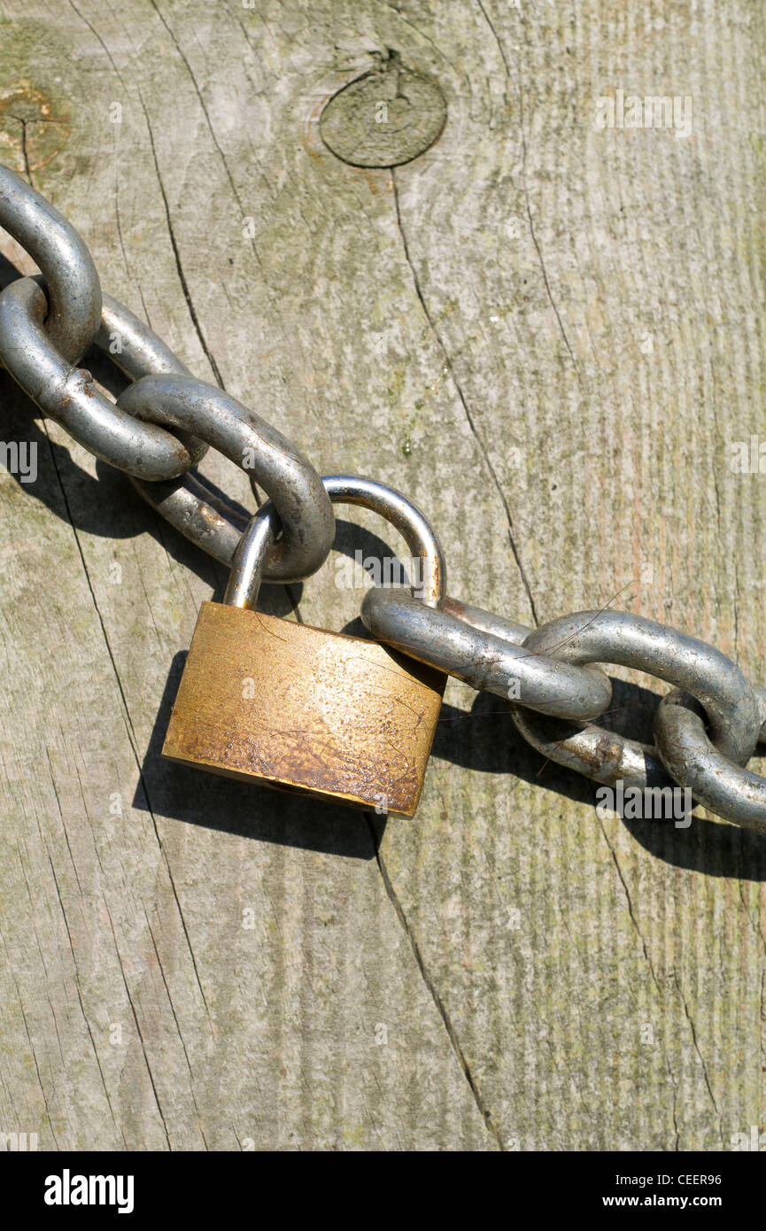 Padlock and Chain on Wooden Farm Gate Stock Photo Alamy