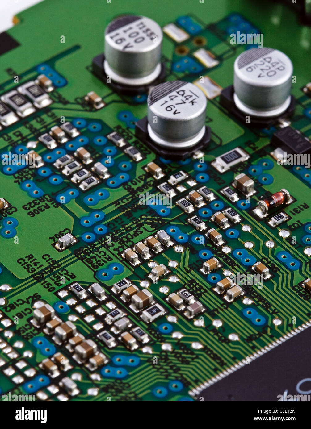 Different electonic elements on circuit board Stock Photo Alamy