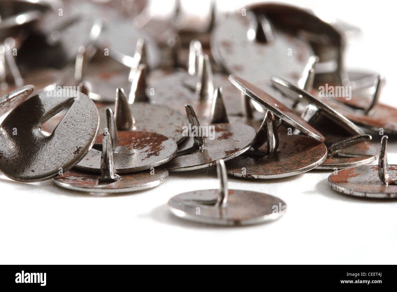 Old rusty push-pins Stock Photo - Alamy