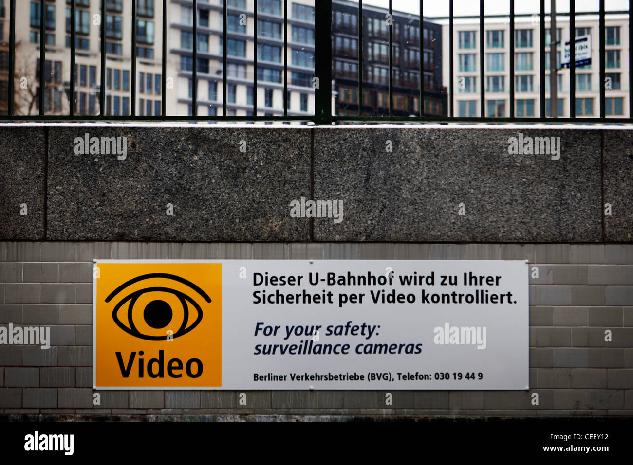 Entrance to Potsdamer Platz U-Bahn station with video camera warning Stock Photo