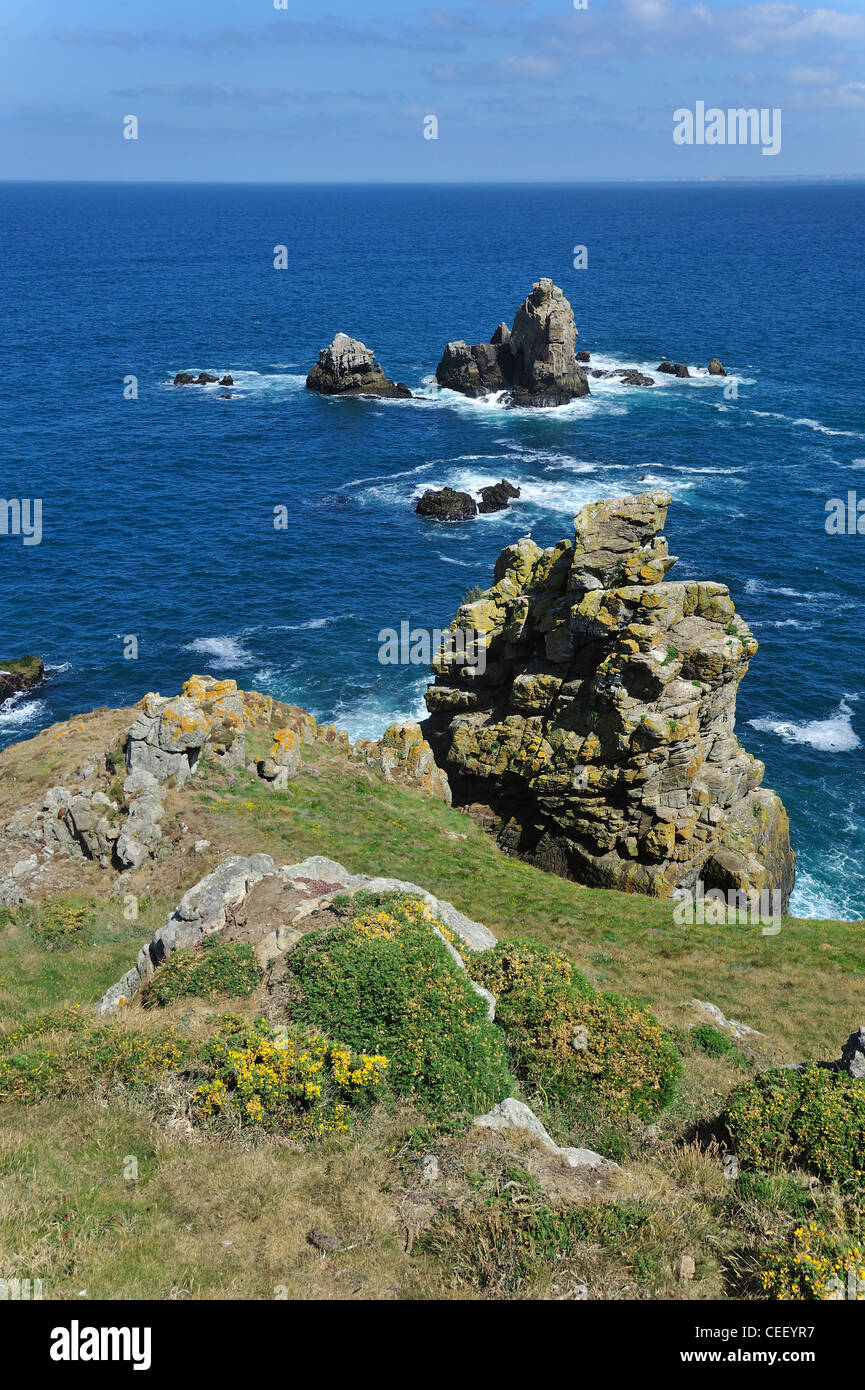 Sea stacks along the rocky coast at Cap de Sizun, nature reserve and bird sanctuary in Finistère, Brittany, France Stock Photo