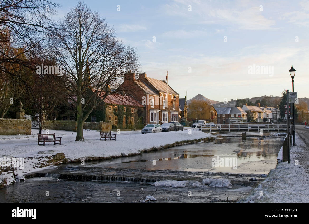 Village of Great Ayton and River Leven in snow, early morning, seen