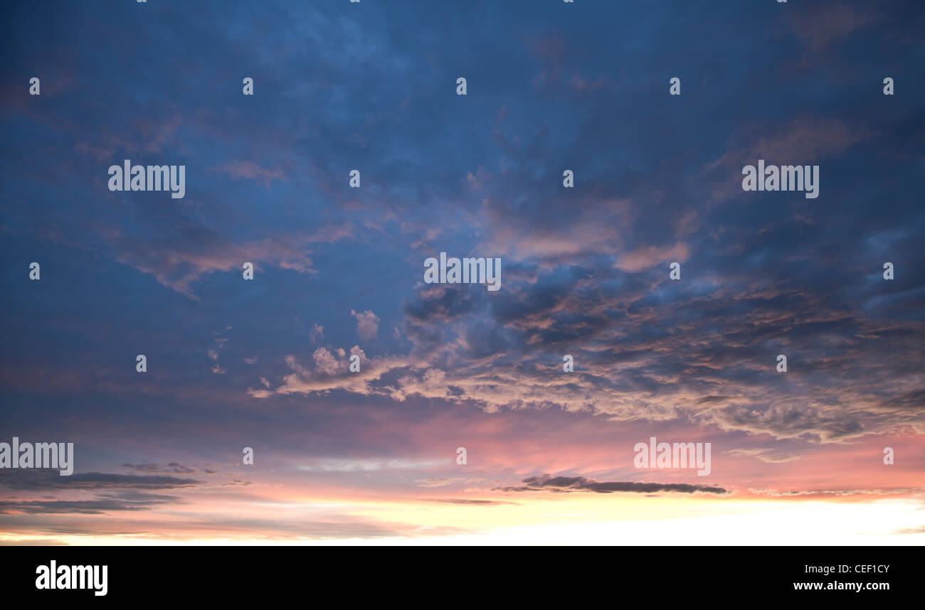 Beautiful blue and pink sky at dusk right after sunset. Stock Photo
