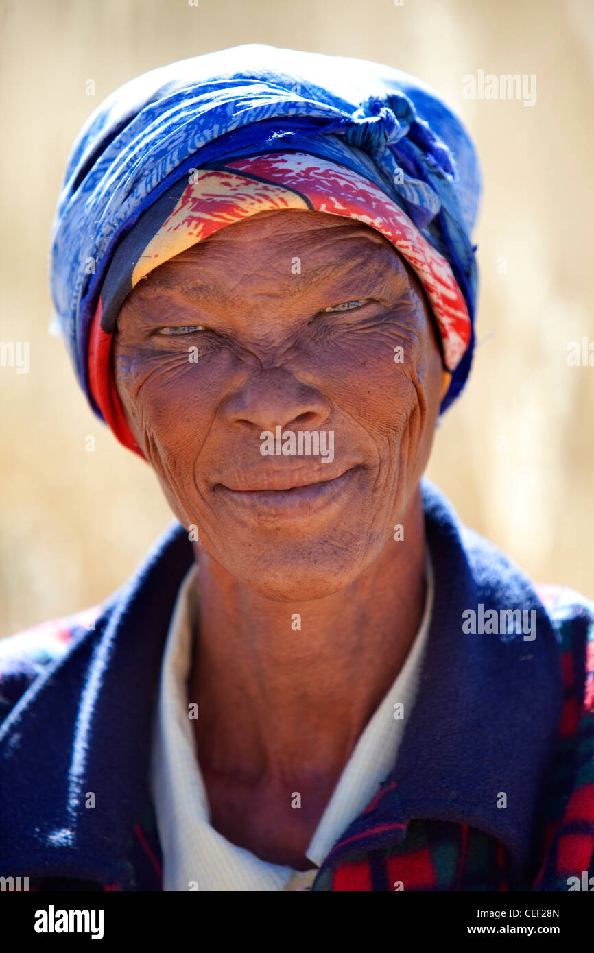 Native woman from the Sam tribe in Kagalagadi Transfrontier Park, Xaus camp, Namibia, Africa Stock Photo