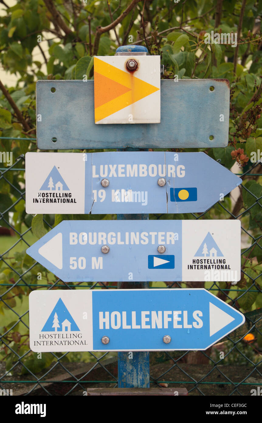 Several Youth Hostel signs in Bourglinster, Luxembourg. Stock Photo