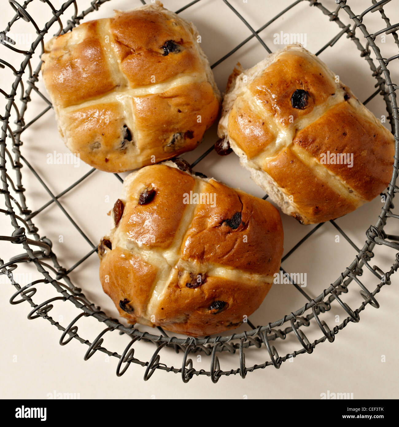 Hot cross buns on wire baking rack Stock Photo