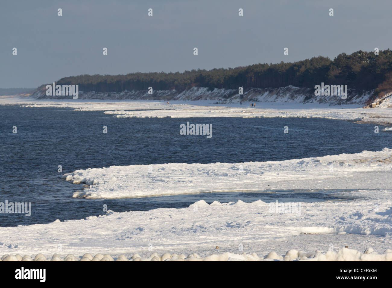 Snow-covered beach in Niechorze, on the west coast of the Baltic Sea in Poland. Winter on the Baltic Sea Stock Photo