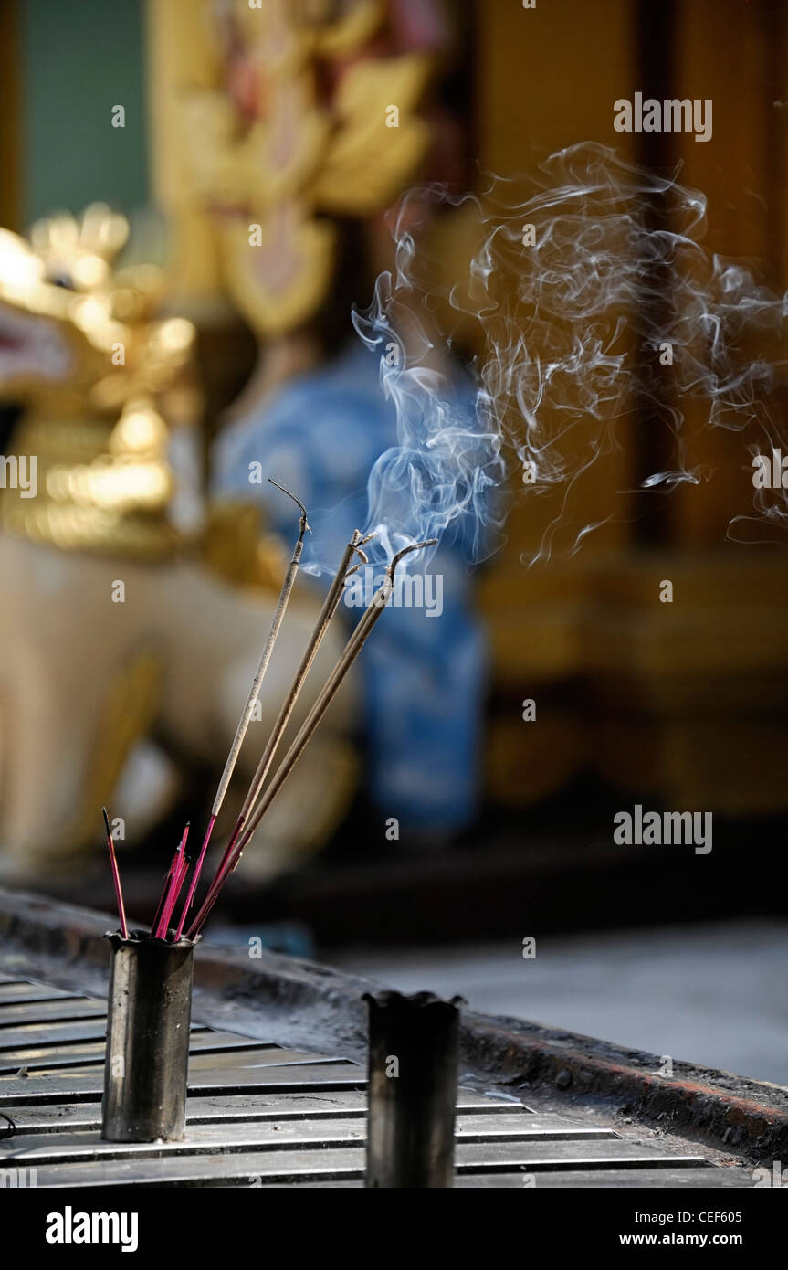 incense sticks burn burning buddhist shrine smoke buddhism Shwedagon