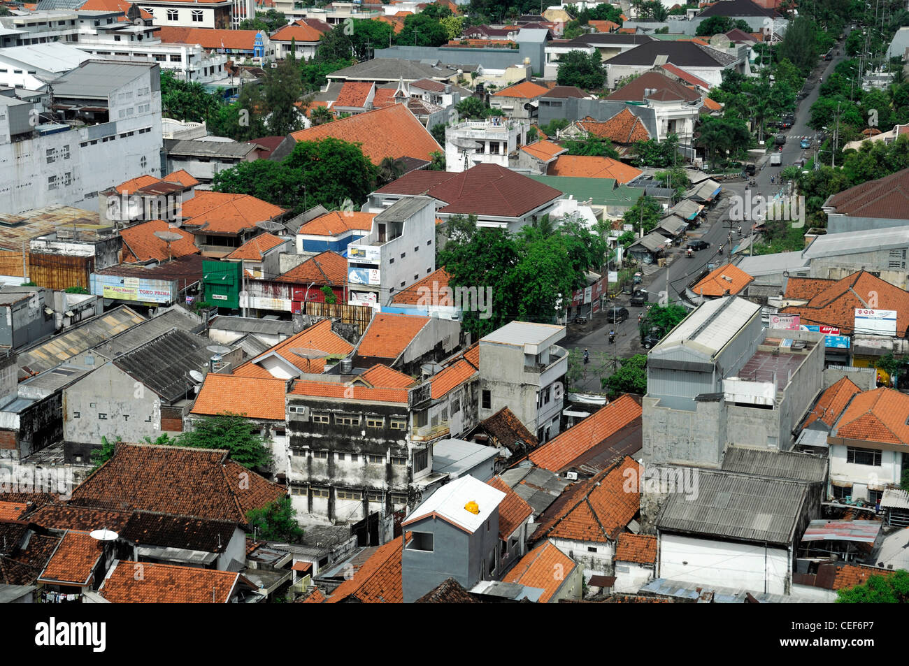 aerial rooftop view crowded houses housing living conditions squalor squalid surabaya indonesia population populace city muslim Stock Photo