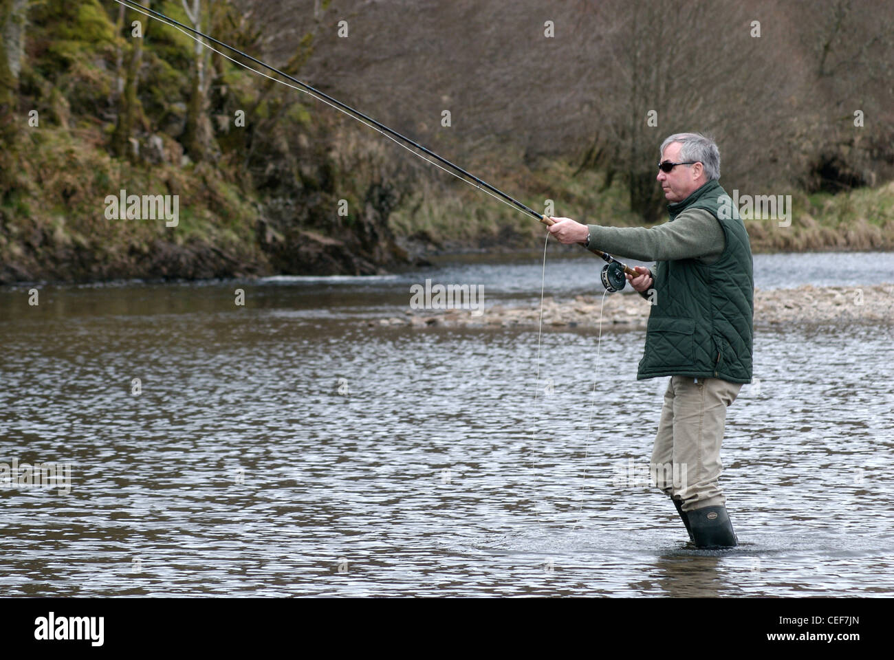 Man Salmon Fishing in the River Oykel, Sutherland, Scotland, UK Stock ...