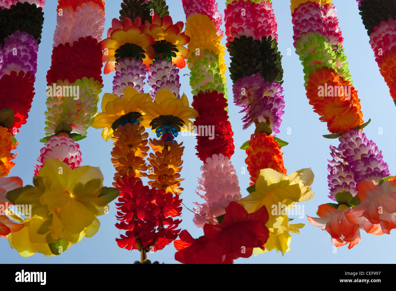 Colorful flower wreaths, decoration of Diwali, Festival of Lights, Jaipur, Rajasthan, India Stock Photo