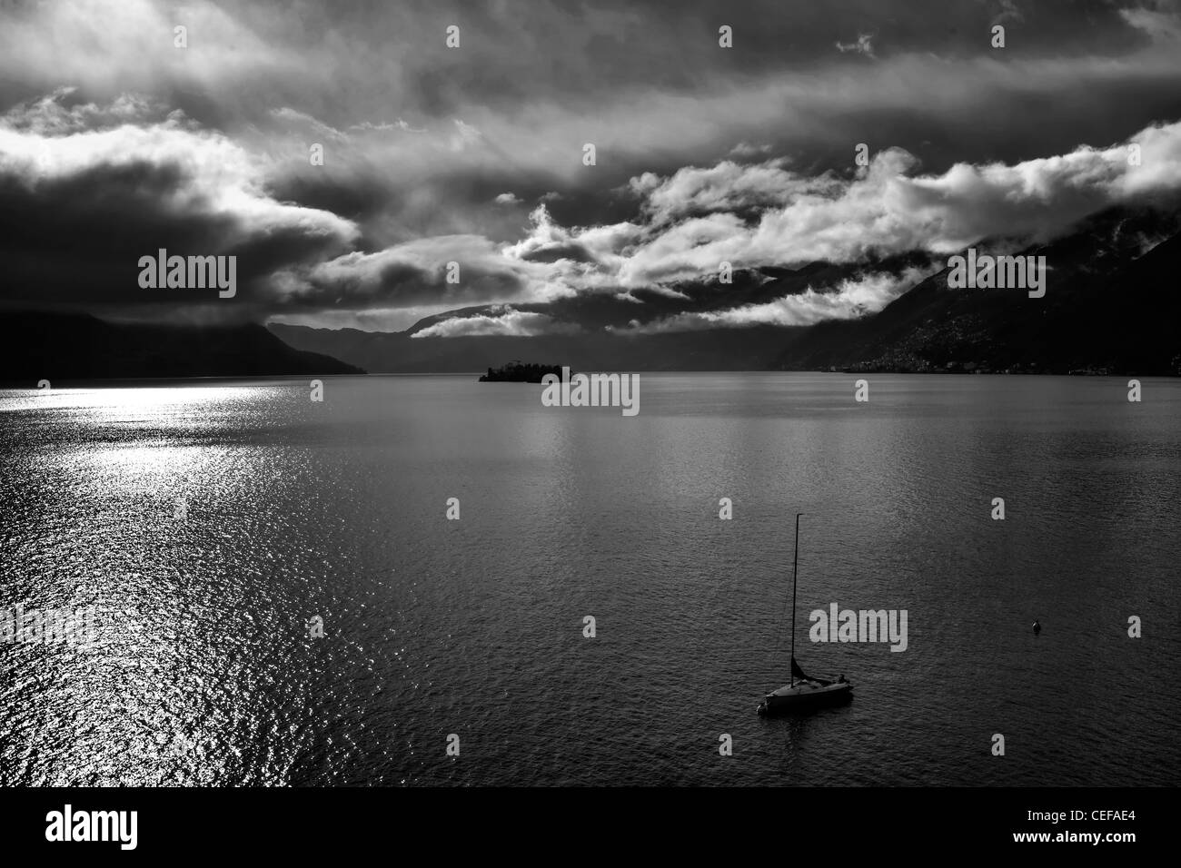 Clouds over the Lago Maggiore, which had formed after a rain in the winter. Stock Photo