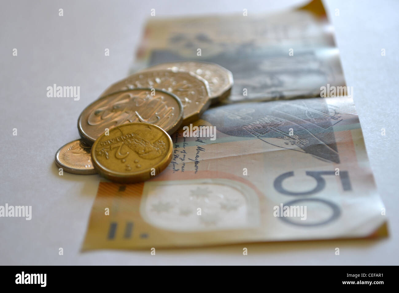 Australian currency, 50 dollar note and some coins Stock Photo