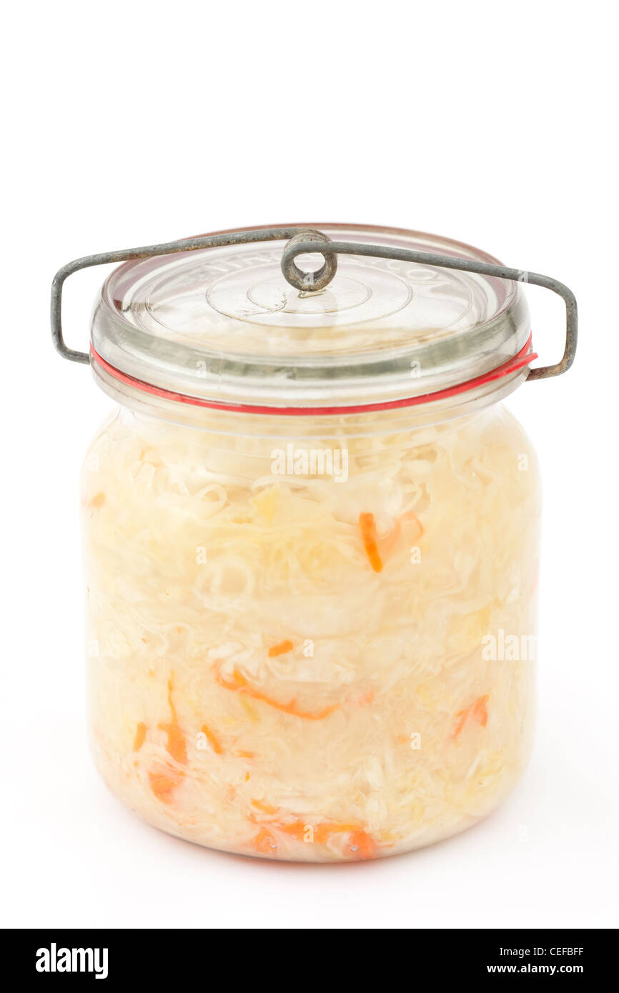 white sauerkraut in jar on white background Stock Photo