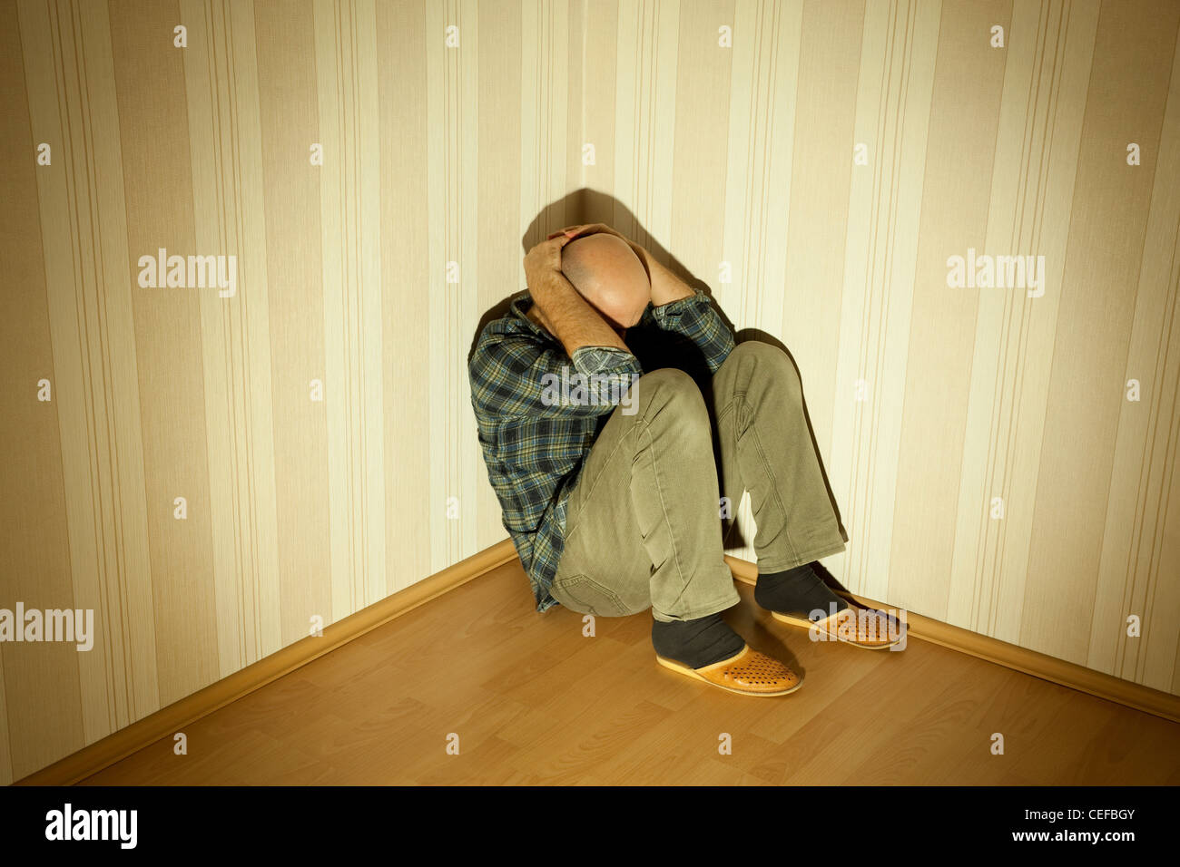 lonely man in angle ill on depression Stock Photo