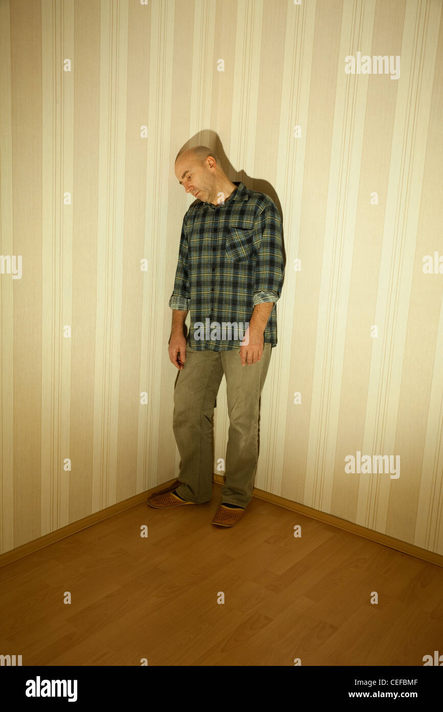 lonely man in angle ill on depression Stock Photo