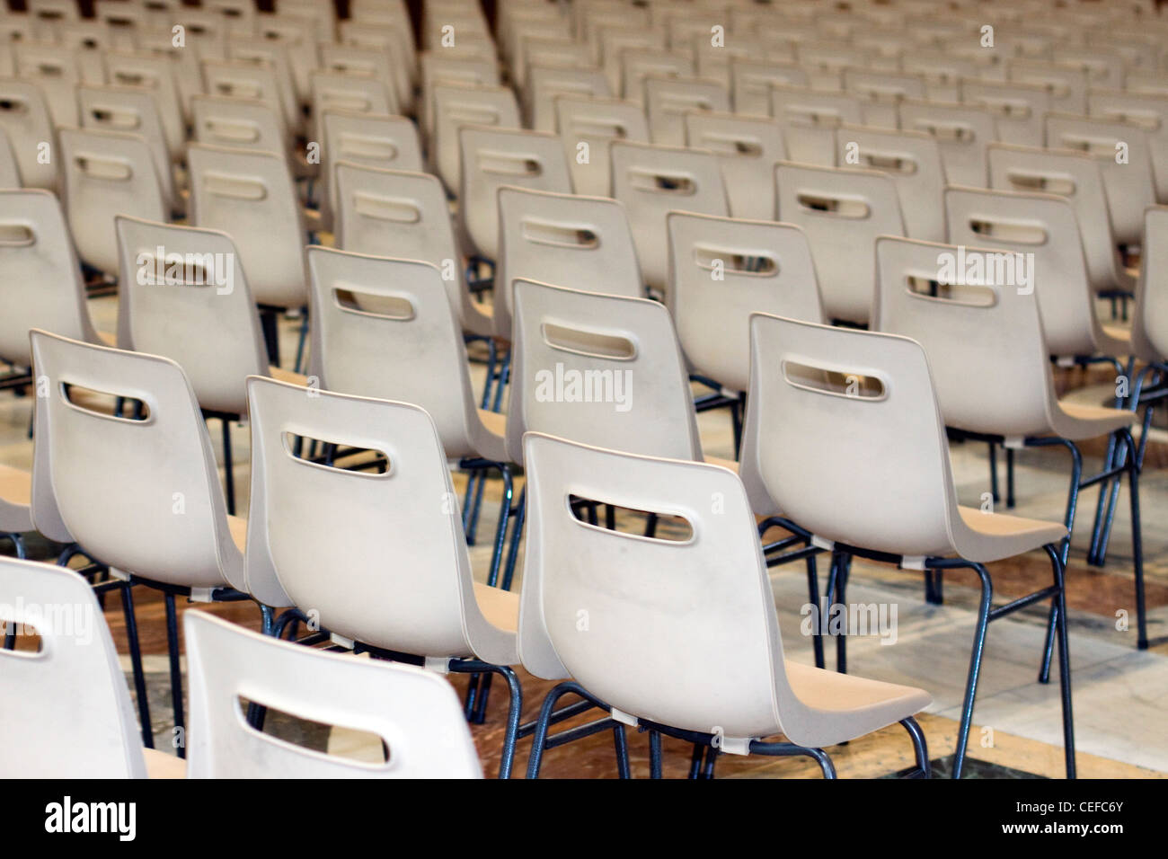 Row of empty chairs at the Alter of St. Peter's Basilica Basilica di San Pietro Vatican city Rome Stock Photo