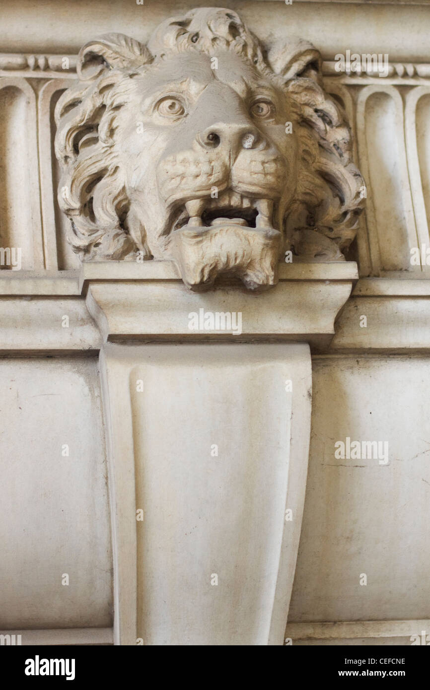 The Face of a Lion on a Pillar inside the gates of  St. Peter's Basilica Basilica di San Pietro Vatican city Rome Stock Photo